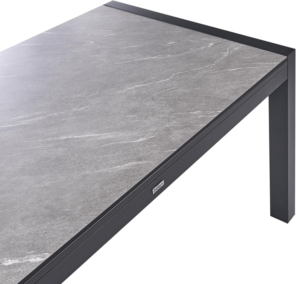 Mesa de jardín Beliani HPL efecto piedra gris rectangular 160/220x90 cm extensible con estructura de metal negra Binasco