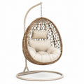 Sillón colgante de ratán PE con cojín beige