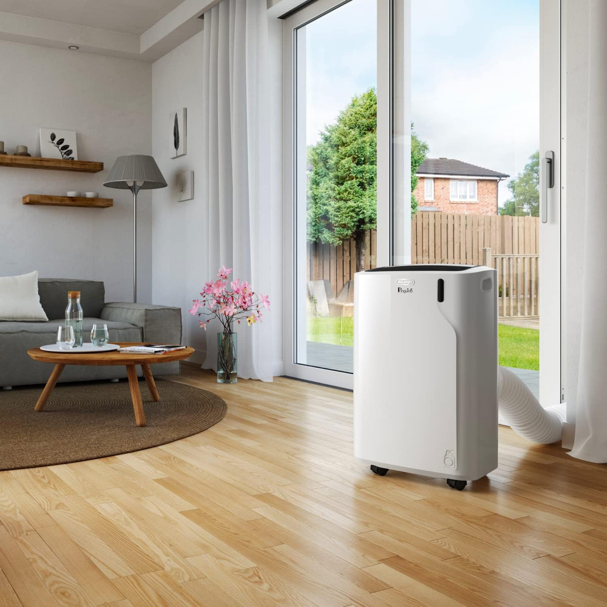 De'Longhi Pinguino - Mobiles Klimagerät, für Räume bis 29 m², mit Luftentfeuchter & Ventilator, 9800 BTU, Leiser Betrieb, Fernbedienung, 24h-Timer, Energieeffizienzklasse A (PACEM90)